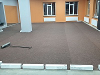 Укладка резинового спортивного покрытия 